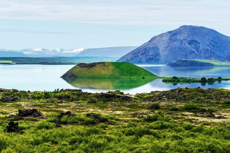 Akureyri Port: Myvatn Nature Baths & Godafoss Waterfall Tour - Lake Mývatn stop and Skútustaðagígar, what volcanic terrain looks like up close