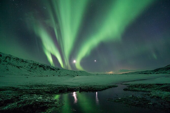 Cozy Northern Lights Tour with Icelandic Treats - A Dark-Sky Search with Max 19 People