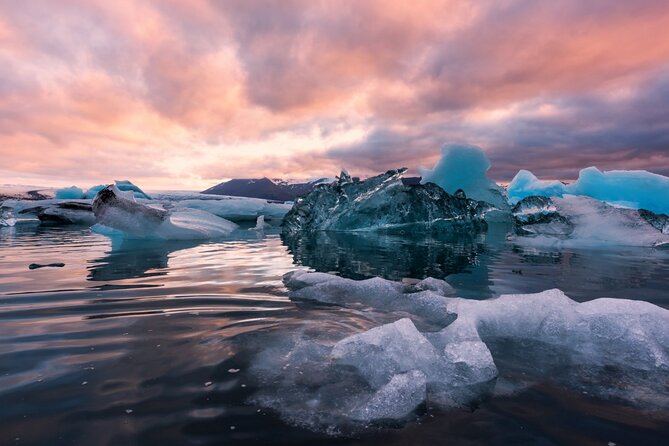 Diamond Beach & Jökulsárlón Floating Glacier Guided Day Tour - Jökulsárlón Glacier Lagoon Boat Time and Breiðamerkurjökull Ice