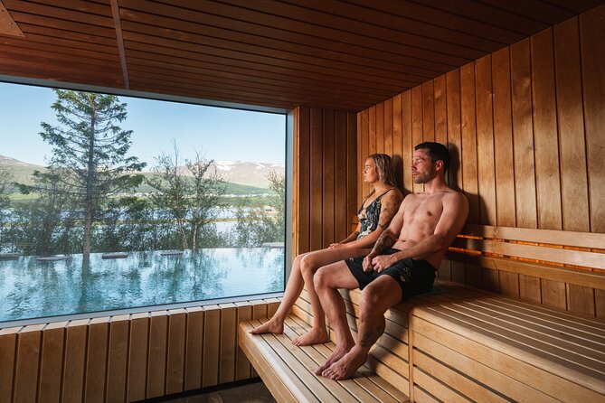 Forest Lagoon Admission Ticket with Towel and One Drink included - Finnish-style dry sauna around 80°C: fjord views and low humidity