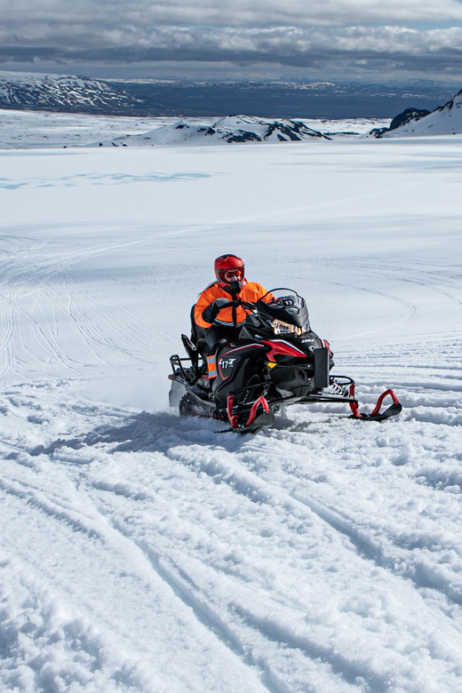 From Geysir: Snowmobiling & Ice Cave on Langjökull Glacier - Riding Langjökull at altitude: thrill with real structure