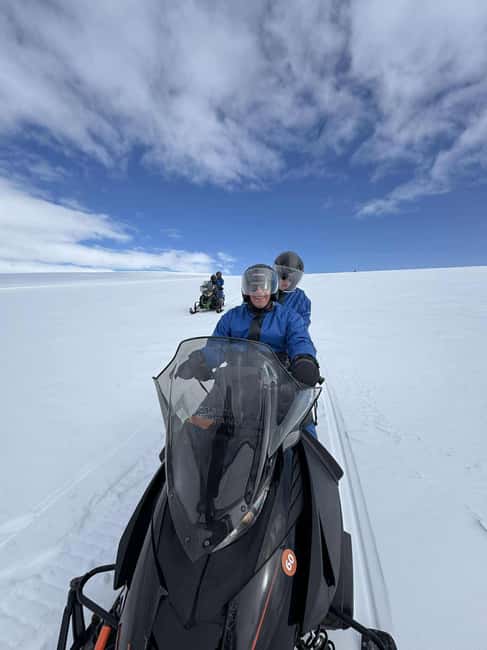 From Husafell: Langjokull Glacier Snowmobile Tour - Riding Langjökull for photos and glacier facts, not just speed