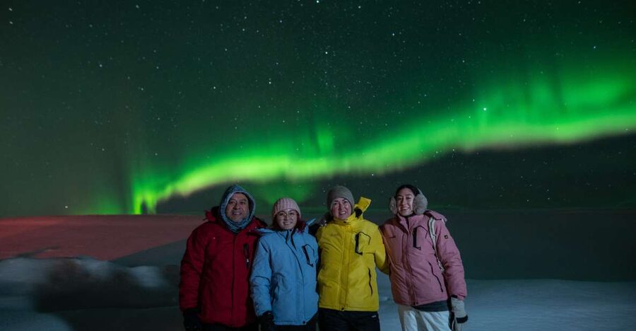 From Reykjavik: Northern Lights Guided Tour with Photos - Hot drinks, warm blankets, and stargazing while you wait