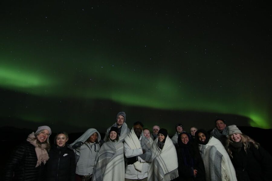 From Reykjavik: Northern Lights Tour with Hot Cocoa & Photos - Stop Details: What You Might See Beyond Reykjavik Lights