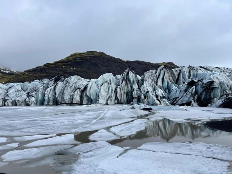 From Reykjavík: South Coast Highlights Day Tour - Reynisfjara black sand beach: basalt drama and Reynisdrangar sea stacks