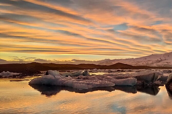 Glacier Lagoon, Diamond Beach, Black Sand Beaches and Waterfalls - Ending near Vík: old church views and black sand angles