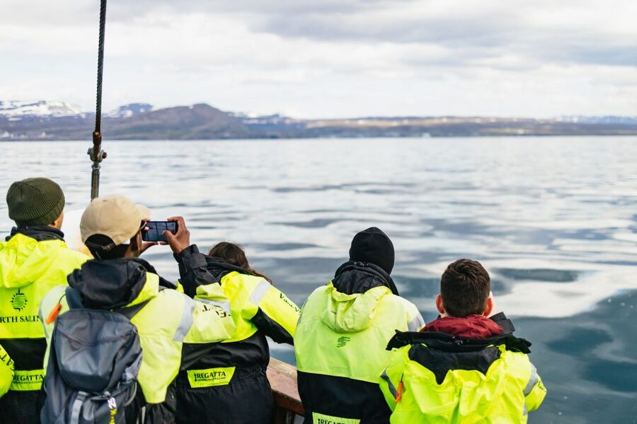 Húsavík: Whale Watching Tour with Guide - Warm overalls, hot chocolate, and cinnamon buns: the comfort payoff