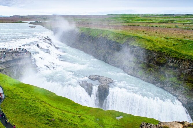 Iceland Golden Circle & Glacier Snowmobiling Guided Experience - Langjökull base camp: suit up without stress