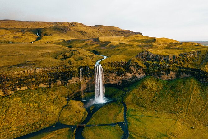 Private South Coast Fire and Ice: Glacier viewpoint & Lava Show - Skogafoss and Reynisfjara black sand beach: the route’s high-impact warm-up