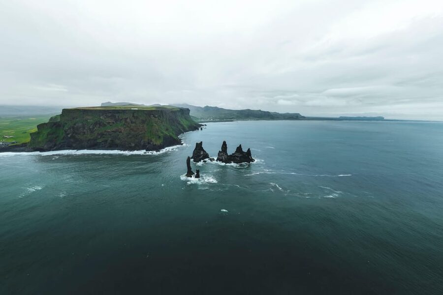 Reykjavik: Glacier Hike & South Coast Day Tour - Reynisfjara black sand beach: basalt columns and ocean drama