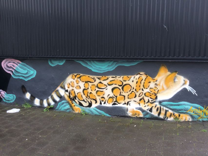 Reykjavik: Guided City Walking Tour - Hallgrímkirkja and the uphill finish: street art, backyards, and a tougher last leg
