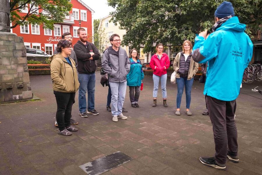 Reykjavik: Guided Folklore Walking Tour - Guides bring the folklore: songs, acting, and humor that actually helps