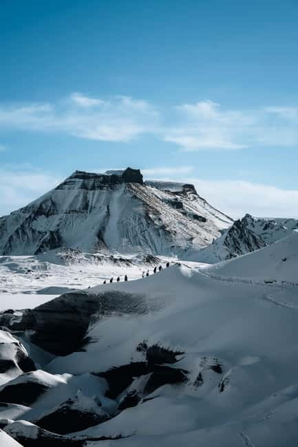 Reykjavik: Katla Ice Cave & South Coast Tour - Inside the Katla Ice Cave: blue, black, and a guided time limit