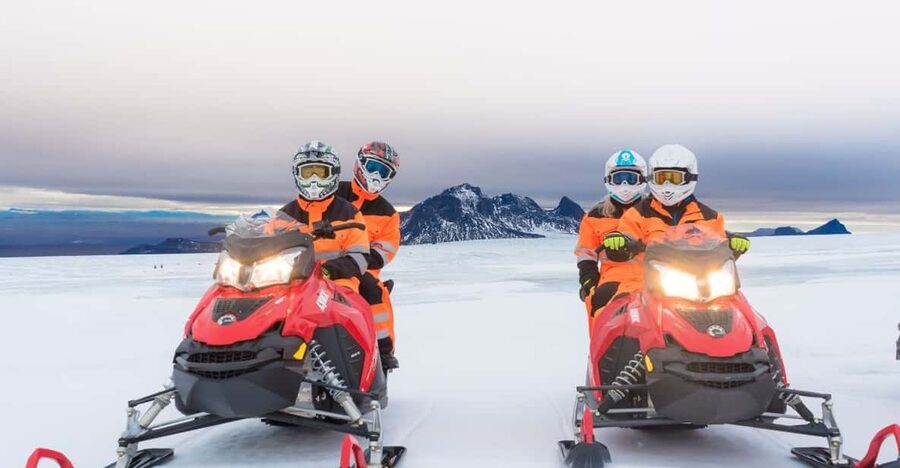 Reykjavík: Langjökull Glacier Snowmobile Tour with Ice Cave - Snowmobile 101 on Ice: Training, Heated Comfort, and Ride Time