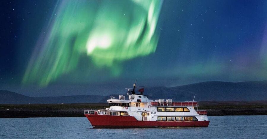 Reykjavík: Northern Lights Cruise - Your Iceland winter survival kit: overalls, heated cabin, and viewing decks