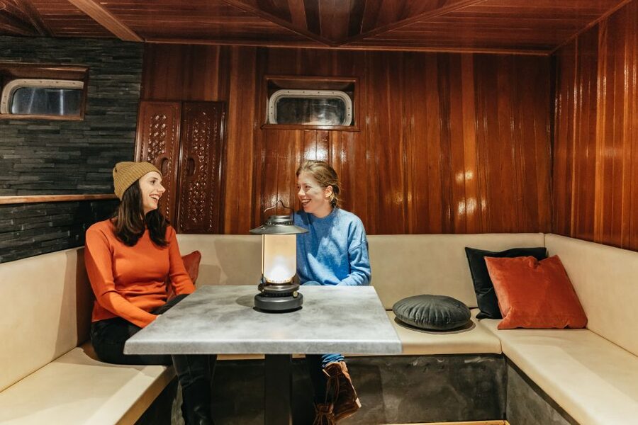 Reykjavik: Northern Lights Yacht Tour - Inside comfort: the bar and lounge that keep your night going