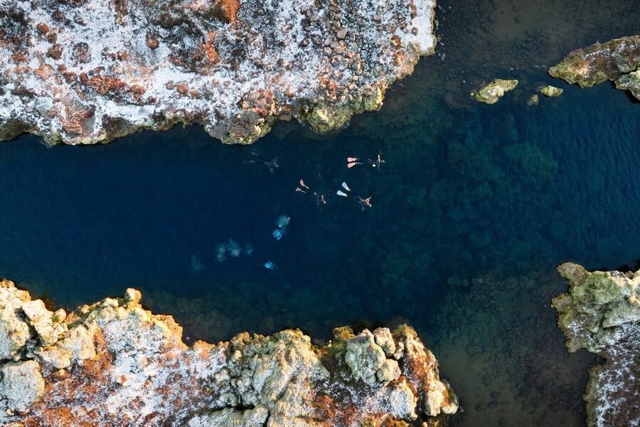 Reykjavík: Silfra Fissure Snorkeling between Two Continents - Included gear and photos: what you save by booking this