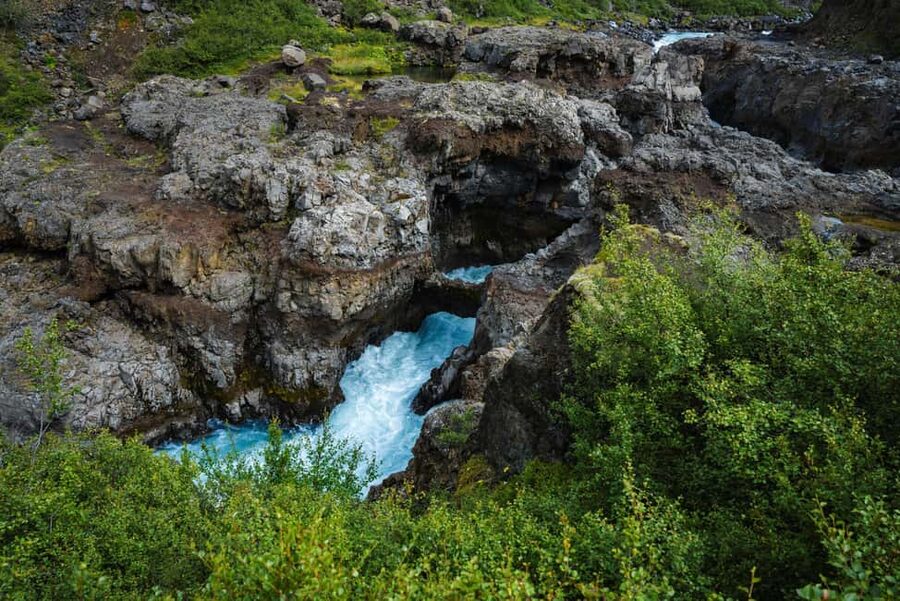 Reykjavik: Silver Circle + Ice Tunnel, Baths, or Lava Cave - Hraunfossar and Barnafoss: delicate cascades, then a blue-foamed punch