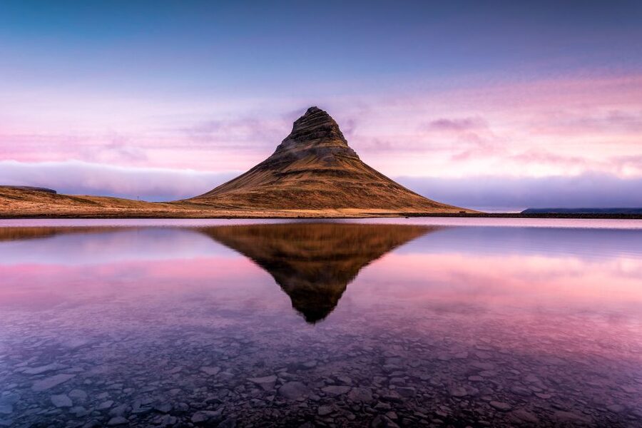 Kirkjufell and the Snaefellsnes shore under a low summer sun