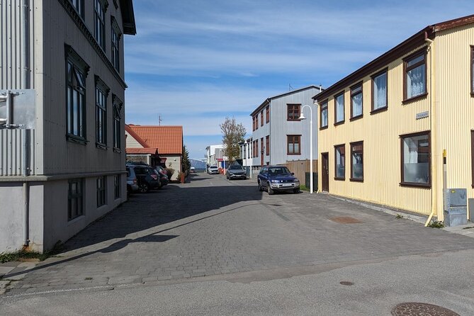 Self-Guided Tour of Ísafjörður: Art, History, and Architecture - Ísafjarðarkirkja: the church, the town’s naming story, and the sun-and-pancake detail