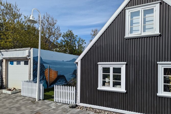 Self-Guided Tour of Ísafjörður: Art, History, and Architecture - Jónsgarður Park and the Whalebone Arch: a green break and an instant photo