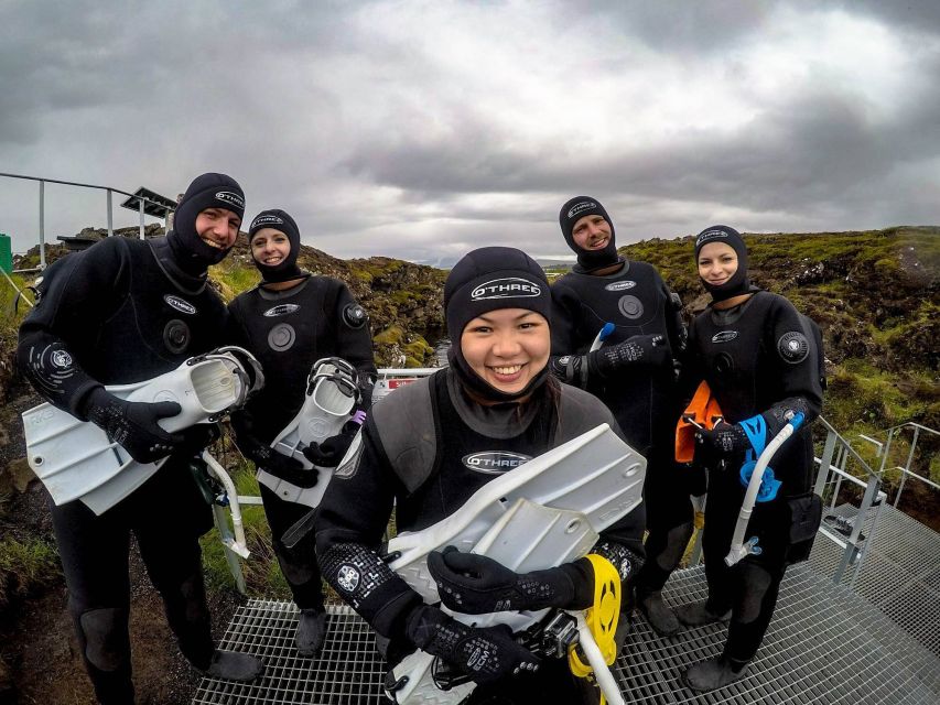 Silfra: Fissure Snorkeling Tour with Underwater Photos - What you see under the ice-like clarity: meltwater colors, rocks, and dwarf char