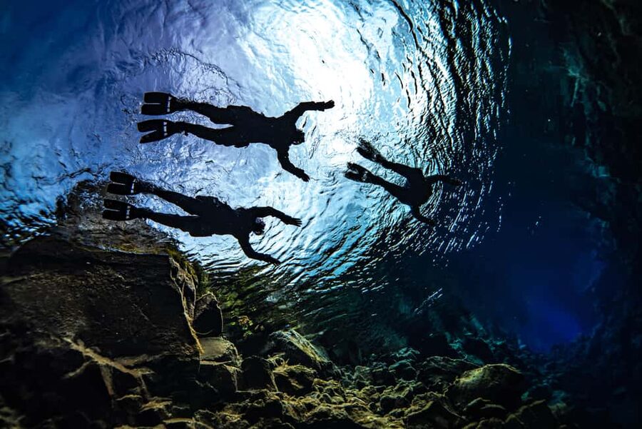 Silfra: Snorkel Between Continents. Free Professional Photos - Cold-water comfort: Dry gloves and a warm suit system that actually helps