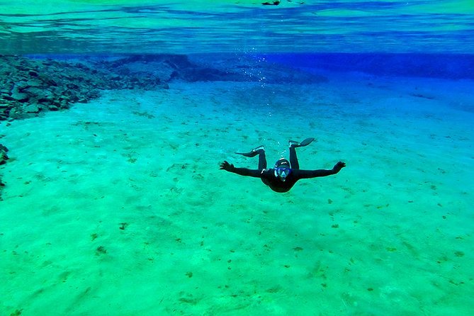 Silfra Wetsuit Snorkeling - Meet on Location | Free Photos - In the water: timing, temperature, and that jaw-dropping clarity