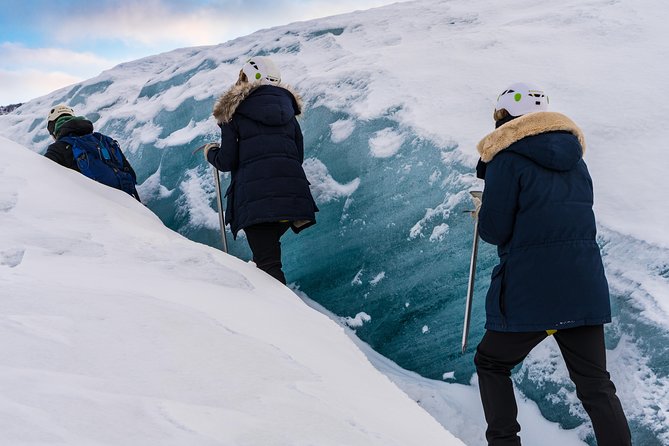 Skaftafell: Blue Ice Glacier Hike on Vatnajökull - Stepping onto Falljökull: crampons, uphill steps, and blue ice