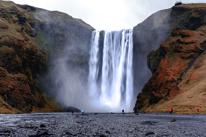 South Coast and Glacier Walk Full day Private Tour From Reykjavík - Reynisfjara black sand, sea stacks, and wave reality