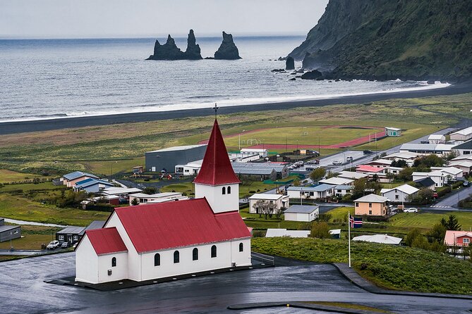 South Coast and Glacier Walk Full day Private Tour From Reykjavík - Skógafoss, Iceland’s waterfall with camera-friendly power