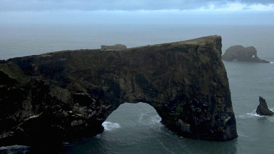 South Coast of Iceland. Black beach, glaсier, waterfalls... - Dyrhólaey Volcanic Sands and the Rock Arch Photo Hit