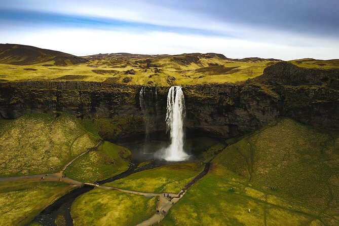 South Coast, Waterfalls and Black Sand Beach (Small Group Tour) - Reynisfjara Black Sand Beach: Basalt Columns, Reynisdrangar, and Saga Talk