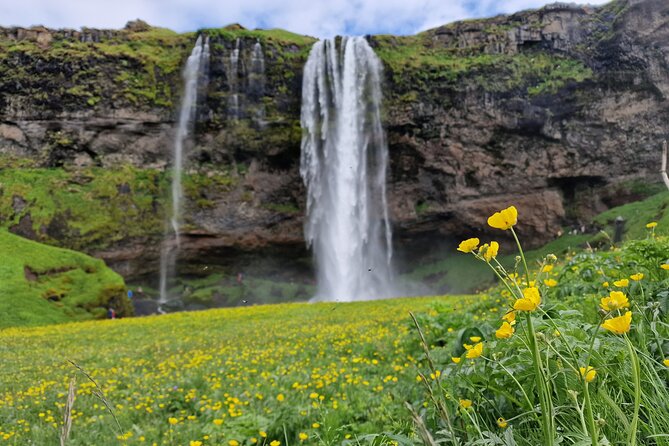 South Iceland, Glacier and Black Sand Beach Small Group Tour - Skógafoss stairs and views of Eyjafjallajökull