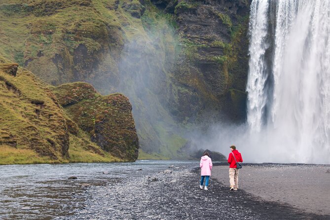 South Iceland, Glacier and Black Sand Beach Small Group Tour - Seljalandsfoss: Walk behind a 60-meter waterfall