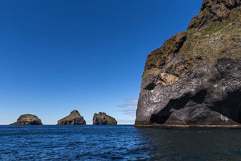 Vestmannaeyjar: Heimaey Island Round Boat Tour - Elephant Rock and the sea caves with music