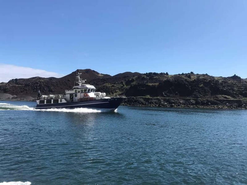 Vestmannaeyjar: Heimaey Island Round Boat Tour - Understanding Heimaey through volcanic history and island life