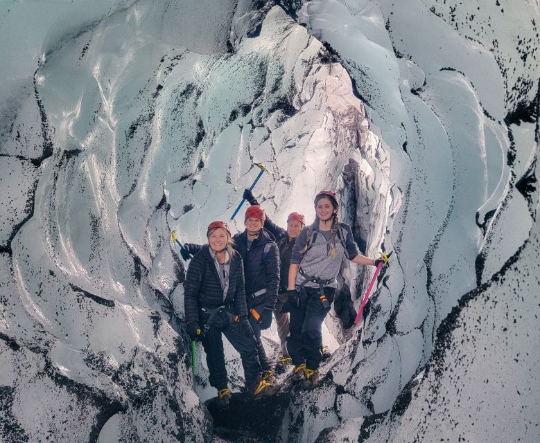 Vik: Guided Glacier Hike on Sólheimajökull - Getting kitted up: harness, helmet, crampons, and first steps